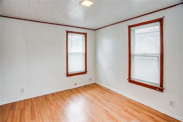 239 Weyl, Rochester, NY 14621 - empty room featuring light wood-style floors, ornamental molding, and baseboards
