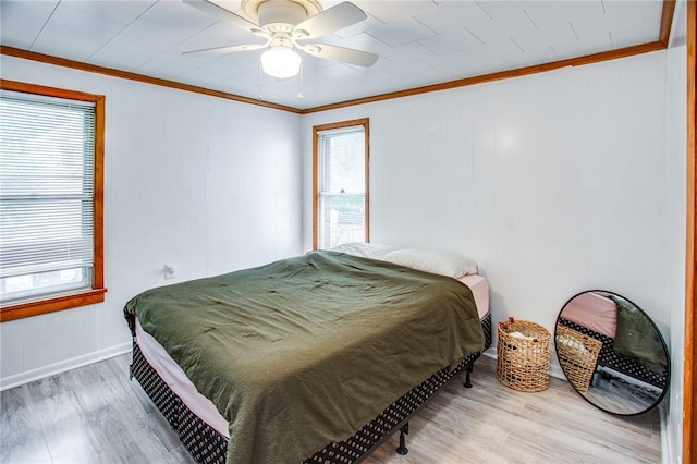 239 Weyl, Rochester, NY 14621 - bedroom featuring multiple windows, wood finished floors, ornamental molding, and ceiling fan