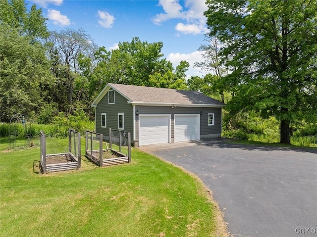 8796 State Highway 12, Sherburne, NY 13460 - detached garage featuring a garden