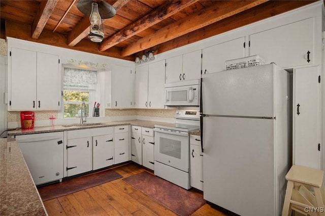 8796 State Highway 12, Sherburne, NY 13460 - kitchen with white appliances, a sink, wooden ceiling with exposed beams, dark wood-style floors, and white cabinetry
