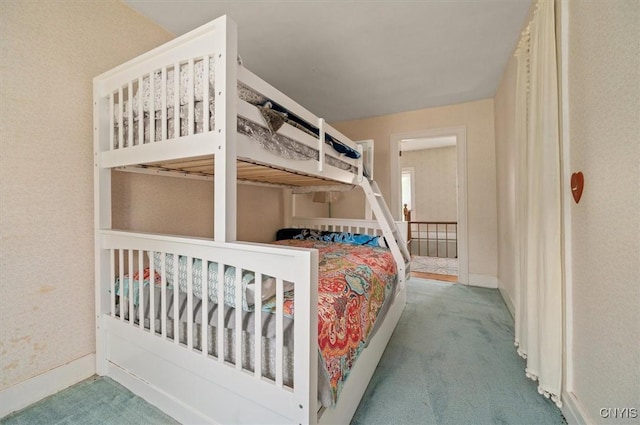 8796 State Highway 12, Sherburne, NY 13460 - bedroom with carpet and baseboards