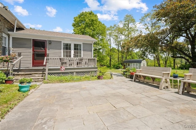 8796 State Highway 12, Sherburne, NY 13460 - porch with a patio area
