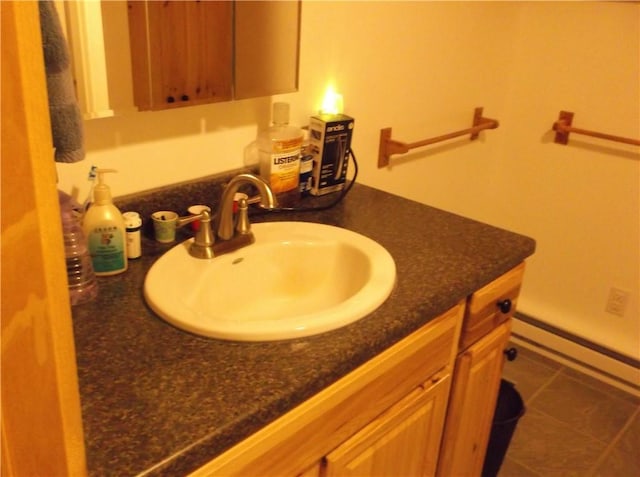 24780 State Highway 206, Colchester, NY 13755 - bathroom with vanity, tile patterned floors, and a baseboard radiator