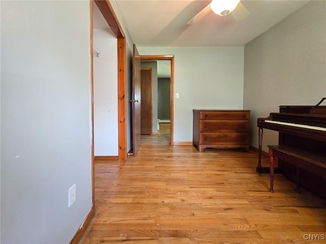 3636 Kennedy Rd, Lafayette, NY 13084 - hall with light wood-style flooring, baseboards, and a baseboard radiator