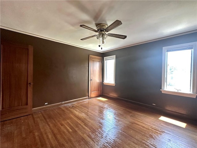 966 W Church St, Elmira, NY 14905 - unfurnished room featuring baseboards, wood finished floors, ceiling fan, and ornamental molding