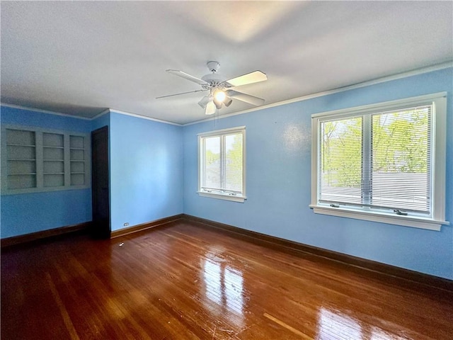 966 W Church St, Elmira, NY 14905 - spare room with ornamental molding, wood finished floors, ceiling fan, and baseboards
