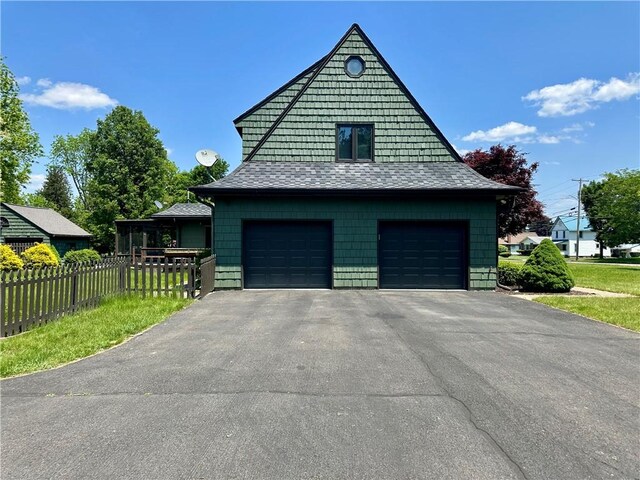 966 W Church St, Elmira, NY 14905 - view of side of home with roof with shingles and driveway