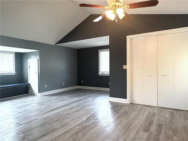 966 W Church St, Elmira, NY 14905 - unfurnished bedroom featuring lofted ceiling, wood finished floors, baseboards, and ceiling fan