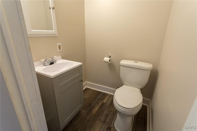 4 Division St, Van Buren, NY 13027 - half bath featuring toilet, vanity, wood finished floors, and baseboards
