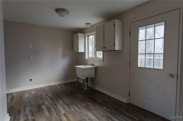 4 Division St, Van Buren, NY 13027 - kitchen with white cabinetry, dark wood finished floors, and baseboards