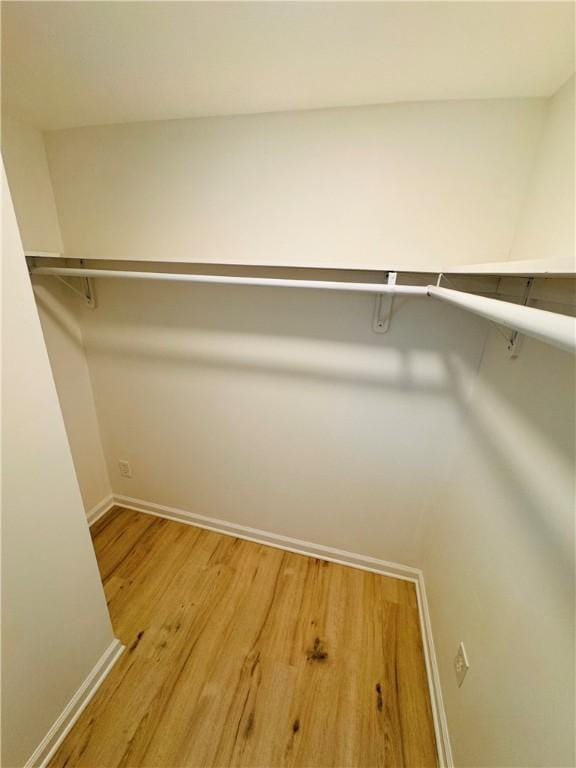 11 Laureldale Dr, Pittsford, NY 14534 - spacious closet featuring light wood-style floors