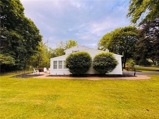 11 Laureldale Dr, Pittsford, NY 14534 - back of property featuring a yard