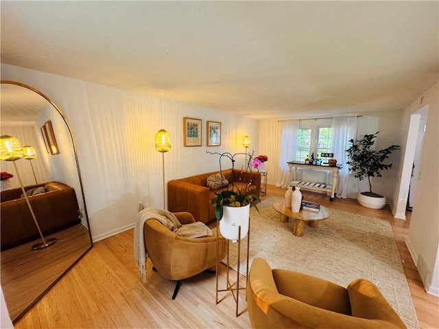 11 Laureldale Dr, Pittsford, NY 14534 - living area featuring light wood finished floors and baseboards