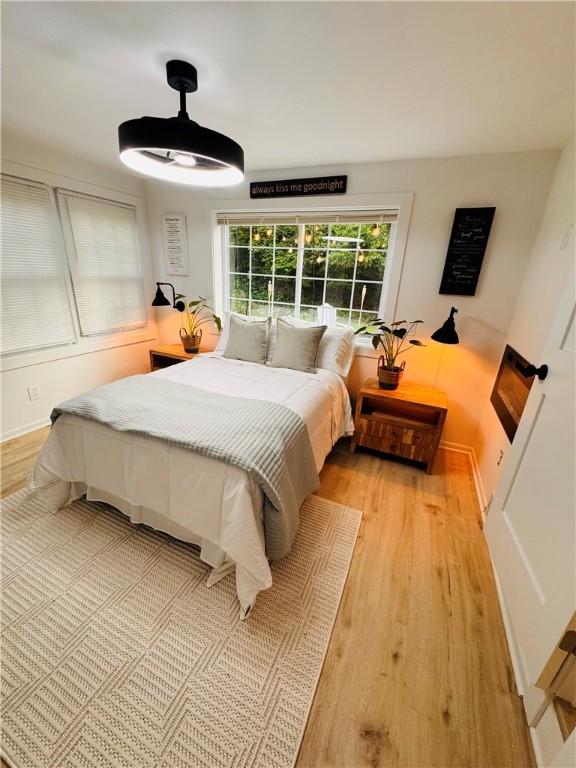 11 Laureldale Dr, Pittsford, NY 14534 - bedroom with wood finished floors