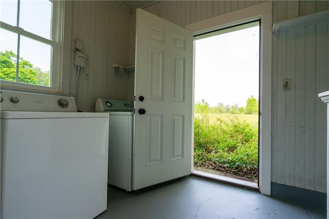 1516 Lake Rd, Webster, NY 14580 - laundry room with independent washer and dryer and wooden walls
