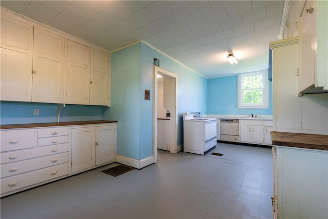 1516 Lake Rd, Webster, NY 14580 - kitchen featuring dishwasher, range, ornamental molding, baseboards, and white cabinets