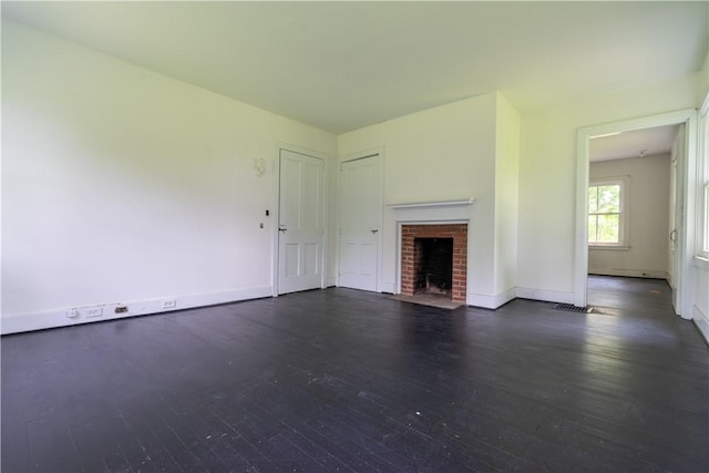 1516 Lake Rd, Webster, NY 14580 - unfurnished living room with dark wood-style floors, a fireplace, and baseboards