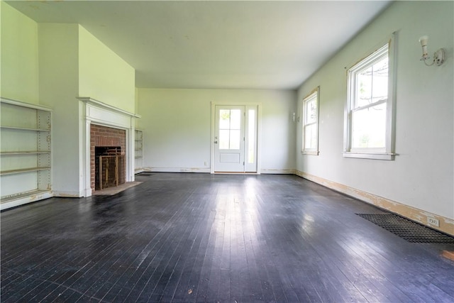 1516 Lake Rd, Webster, NY 14580 - unfurnished living room with hardwood / wood-style flooring, a fireplace, and baseboards