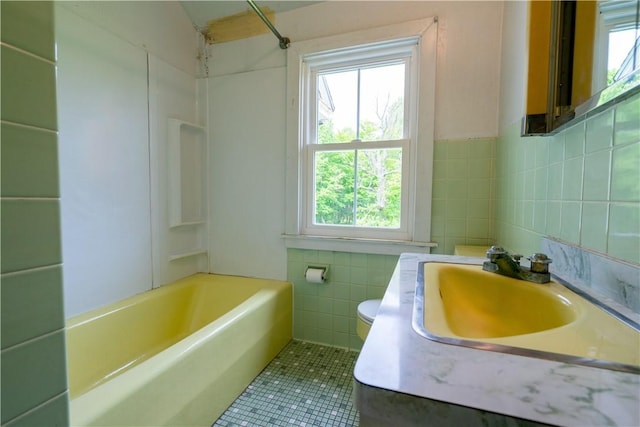 1516 Lake Rd, Webster, NY 14580 - bathroom featuring tile walls, healthy amount of natural light, vanity, and toilet