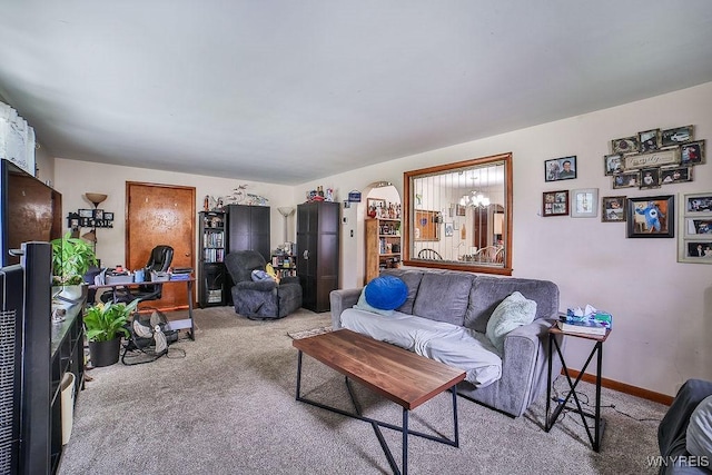 102 Wellworth Pl, Cheektowaga, NY 14225 - carpeted living area with arched walkways and baseboards