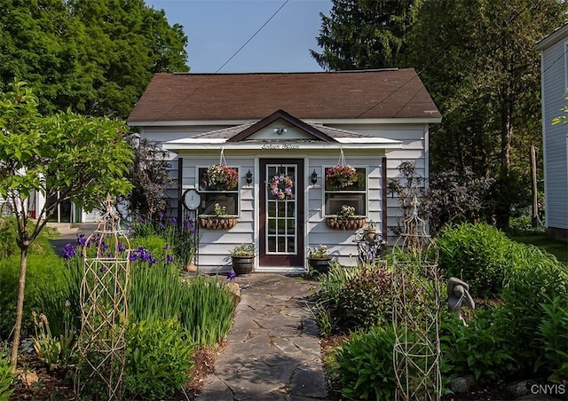 1615 Cortland St, Deruyter, NY 13052 - bungalow-style home with an outdoor structure and roof with shingles