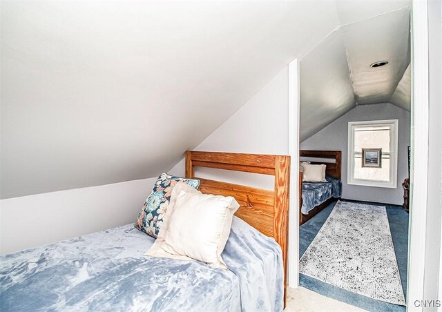 1615 Cortland St, Deruyter, NY 13052 - bedroom featuring vaulted ceiling and carpet flooring