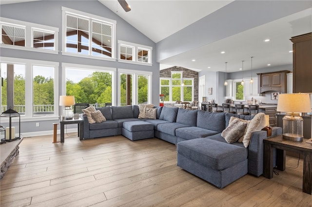 1915 Factors Walk, West Bloomfield, NY 14475 - living room with light wood-style floors, plenty of natural light, recessed lighting, and high vaulted ceiling