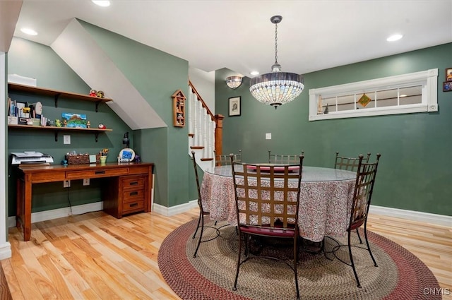 26 Utica St, Kirkland, NY 13323 - dining area with light wood-style flooring, stairway, baseboards, recessed lighting, and a chandelier