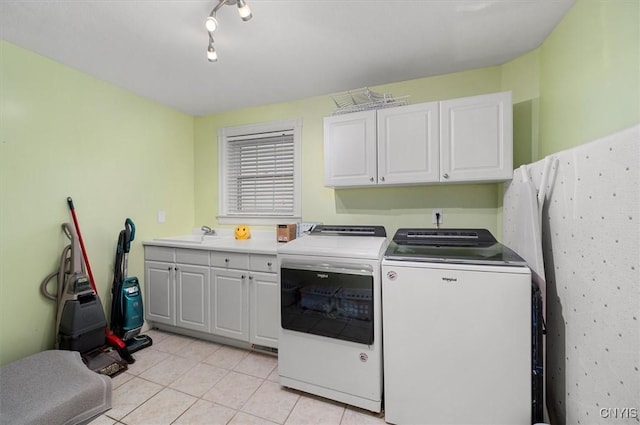 26 Utica St, Kirkland, NY 13323 - washroom with cabinet space, washer and clothes dryer, and light tile patterned flooring