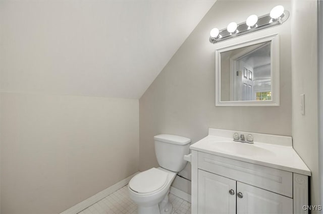 26 Utica St, Kirkland, NY 13323 - bathroom featuring vanity, toilet, lofted ceiling, baseboards, and tile patterned floors