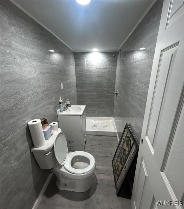 340 Martha Ave, Buffalo, NY 14215 - full bathroom with a tile shower and tile walls