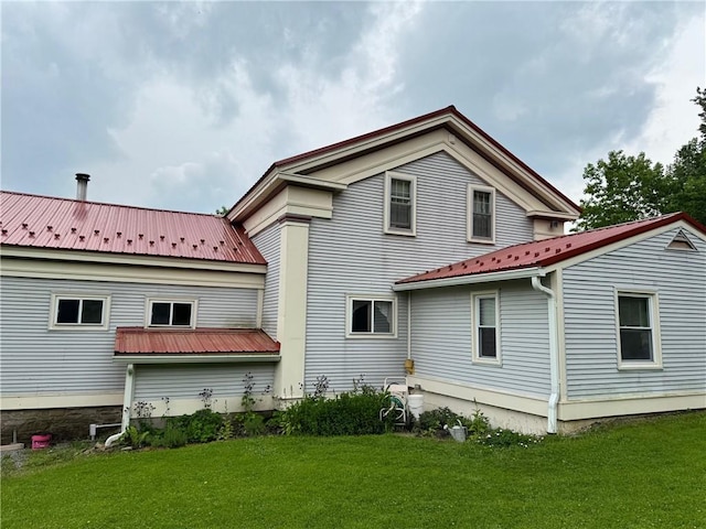 1604 Moland Rd, Alfred, NY 14803 - rear view of property with metal roof and a lawn