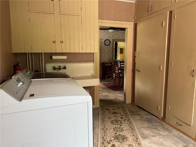 1604 Moland Rd, Alfred, NY 14803 - laundry area with independent washer and dryer, wallpapered walls, and cabinet space