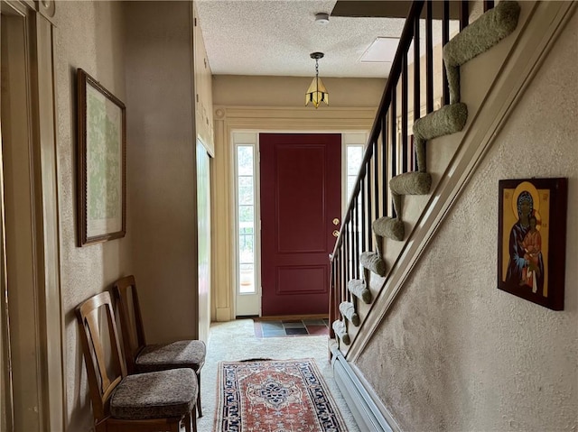 1604 Moland Rd, Alfred, NY 14803 - foyer featuring stairs, a textured ceiling, a textured wall, and carpet floors