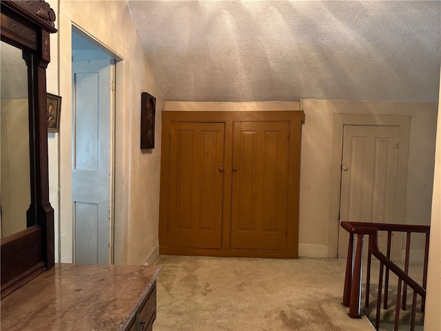 1604 Moland Rd, Alfred, NY 14803 - hallway with light colored carpet, a textured ceiling, and baseboards