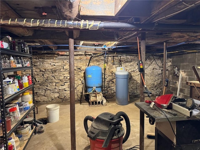 1604 Moland Rd, Alfred, NY 14803 - unfinished below grade area with a water pressure tank and a water softener