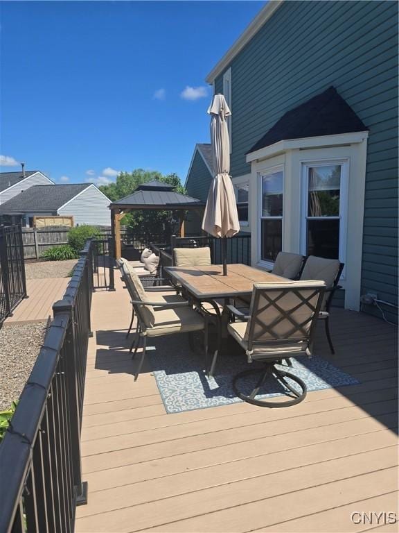 4982 Alfred Dr, Clay, NY 13090 - wooden terrace with outdoor dining space and a gazebo