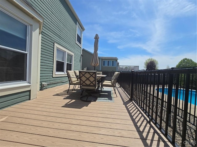 4982 Alfred Dr, Clay, NY 13090 - wooden deck with outdoor dining area