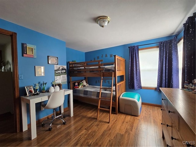 4982 Alfred Dr, Clay, NY 13090 - bedroom with wood finished floors, baseboards, and an office area