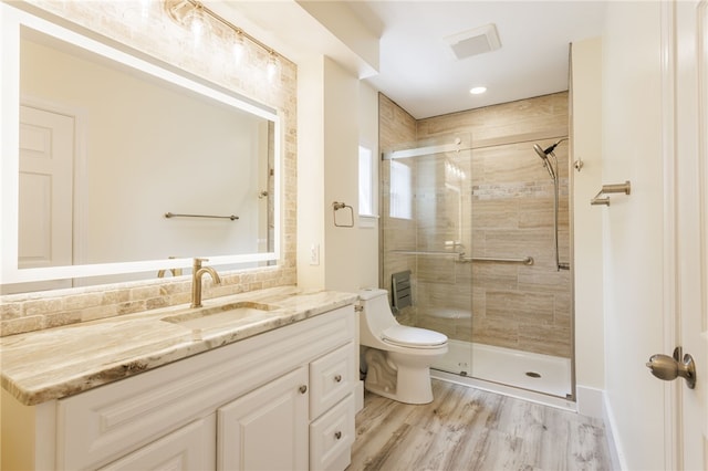 121 Barnard St, Greece, NY 14616 - full bathroom featuring vanity, a stall shower, toilet, wood finished floors, and recessed lighting