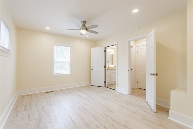 121 Barnard St, Greece, NY 14616 - unfurnished bedroom featuring light wood-style flooring, baseboards, recessed lighting, and ensuite bathroom