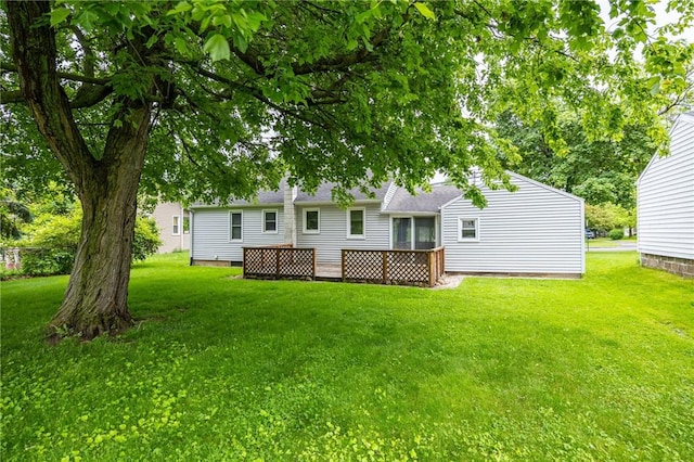 223 S Ave, Parma, NY 14468 - rear view of house with a yard and a wooden deck