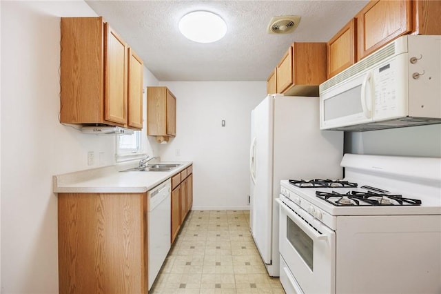 223 S Ave, Parma, NY 14468 - kitchen with white appliances, light floors, a sink, light countertops, and a textured ceiling