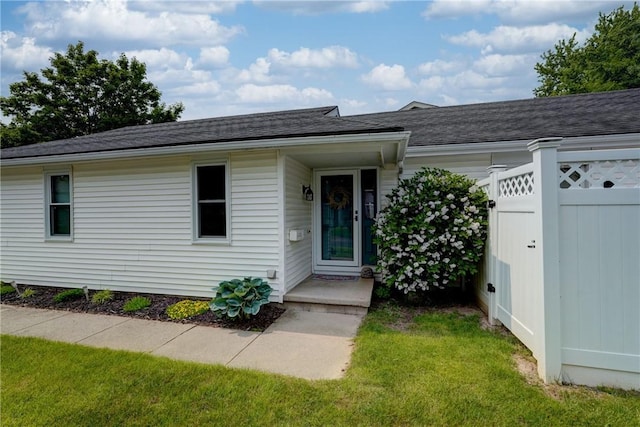 503 Valley Creek Rd, Gates, NY 14624 - ranch-style home with a shingled roof and a front lawn