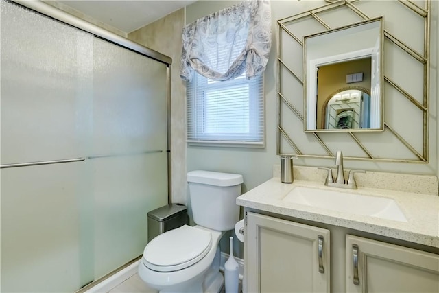 503 Valley Creek Rd, Gates, NY 14624 - bathroom with a shower stall, toilet, and vanity