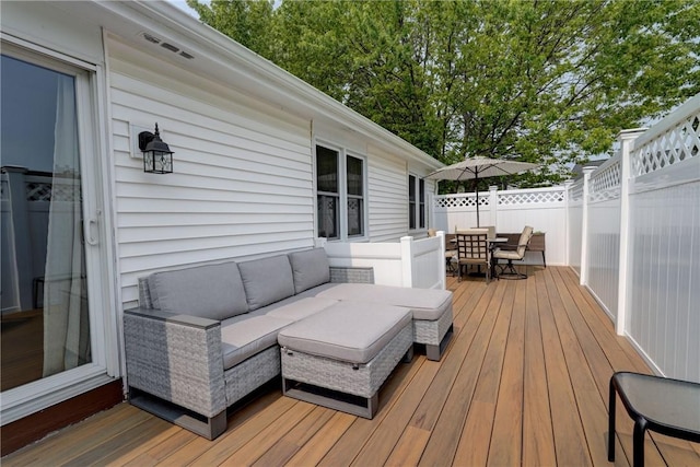 503 Valley Creek Rd, Gates, NY 14624 - wooden terrace featuring an outdoor living space and outdoor dining space