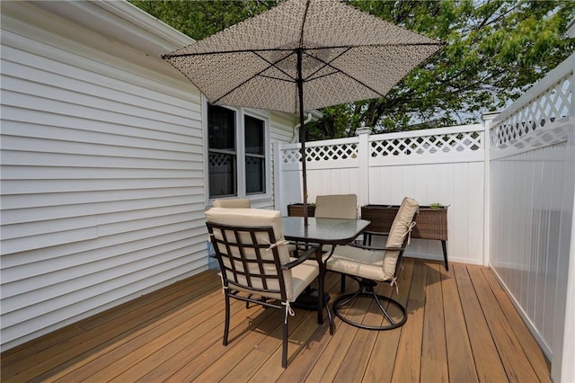 503 Valley Creek Rd, Gates, NY 14624 - wooden terrace with outdoor dining space