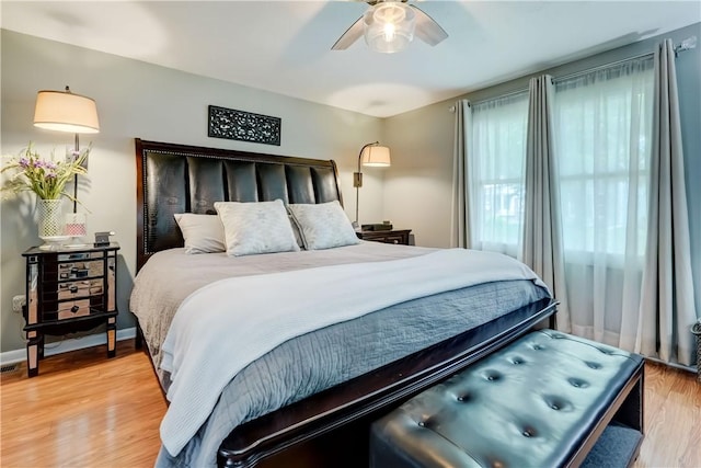 503 Valley Creek Rd, Gates, NY 14624 - bedroom with light wood-style floors and ceiling fan