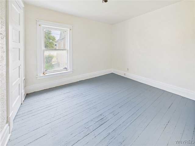 465 10th St, Niagara Falls, NY 14303 - spare room with baseboards and dark wood finished floors