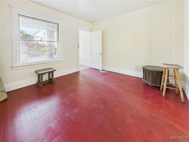 465 10th St, Niagara Falls, NY 14303 - empty room with baseboards and wood finished floors